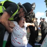 A protester at the Elbit factory in July being dragged of by police