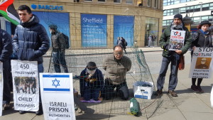 in the cage on palestinina prisoners day